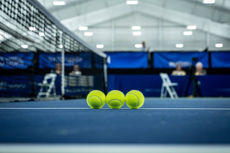 Tennis balls on indoor court